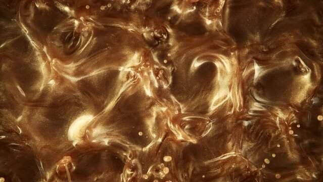 Super Slow Motion Shot of Glittering Shiny Coffee Concept at 1000fps.