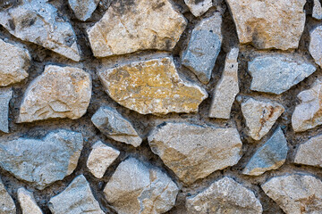 A wall of coarse stone with a wide gap