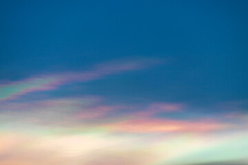 Beautiful iridescent cloud, Irisation. Skyscraper background.
