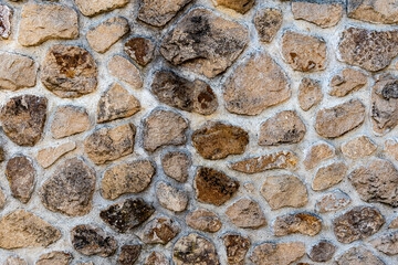 Stone wall composed of irregular blocks of marlstone