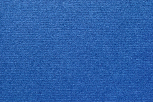 Blue bolor corrugated craft paper texture as background