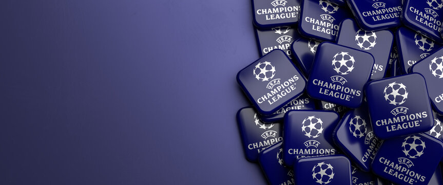Logos of the European soccer Champions League on a heap on a table. Copy space. Web banner format