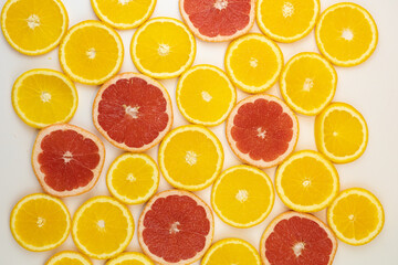 Fresh organic orange slices on surface