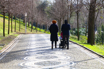 istanbul: tourist people walking on a road intertwined with the forest in Beşiktaş star park