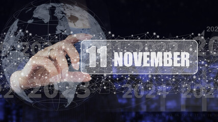 Fototapeta na wymiar November 11st . Day 11 of month, Calendar date. Hand hold virtual screen card with calendar date. Autumn month, day of the year concept.