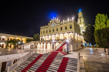 Obraz premium Exterior view of Panagia Megalochari church or Virgin Mary in Tinos island illuminated at night. It is the patron saint of Tinos and considered as the saint protector of Greece