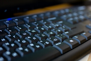 Dust on computer keyboard keys, workplace hygiene, computer cleaning, dirt keyboard