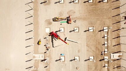 huge construction site with crane and excavators, high quality image, aerial view