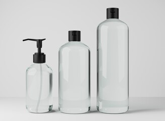 Different transparent glass bottles for hair and body care products 3D render, set of cosmetic containers on gray studio background, packaging mockup