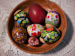 easter eggs in a basket on the table