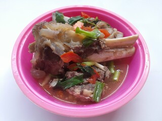 beef rib soup vegetable in bowl top view on a white background. background meal concept, lunch, cuisine, food recipes, cook, cooking, processed meat, delicious, gourmet, homemade food, restaurant
