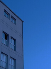 Facade of a building against blue sky background