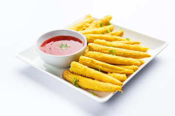 Crispy fried baby corn pakoda, pakora  or Baby corn fritters served with ketchup, Indian food