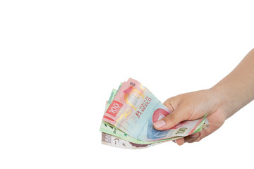 Hand with money making the gesture of paying, with white background