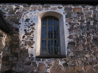 Fototapeta premium The external wall and the window of Sibbo Old Church - Sipoo Finland,
