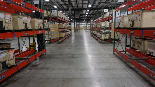 Factory warehouse aisle with shelves 