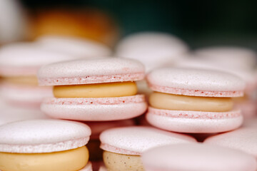 colorful macaroons on a wooden table