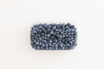 fresh ripe blueberries berries on white