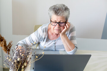 Old women working on laptop