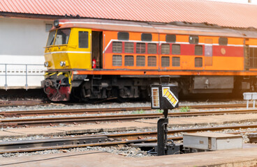 The railway light semaphore on train can go to next station.