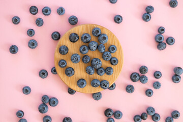 Fresh blueberry on pink background