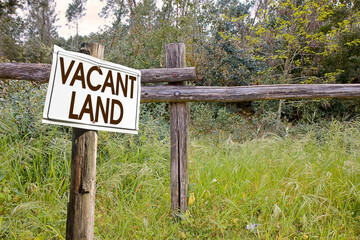 Uncultivated agricultural land for sale - Land plot management - Real estate concept with a wild...