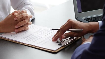 Manager in office discussing and interviewing job applicant for new employees. Submitting a job application and job interviewing.