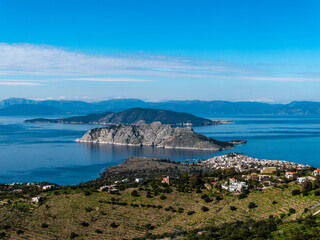 Three Islands in row: Aegina, Moni, Angistri and Peloponnese in the far background, Saronic gulf, Greece.