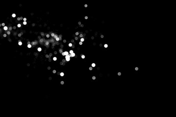 White gray blurred bokeh lights on black background. Glitter sparkle stars for celebrate. Overlay for your design
