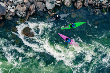 Aerial view extreme kayak boat rough river, sunny day. Concept travel rafting adrenaline