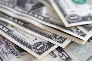 In this photoillustration background of various dollar bills