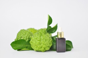 Green kaffir lime fruit, medicinal plant, used as essential oils and used in cooking  isolated on white background