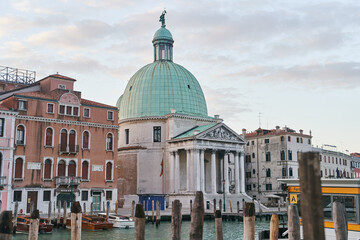 Fototapeta na wymiar Venice, Italy - 10.12.2021: View of San Simeone Piccolo church on waterfront of the Grand Canal in Venice, Italy