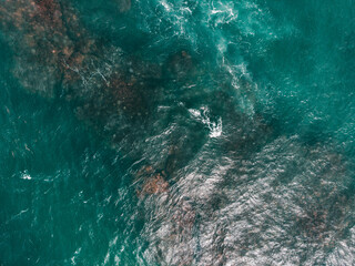 Puerto Rico north side waters - top down aqua blues texture. Ocean drone sea backgrounds from an island in the caribbean.