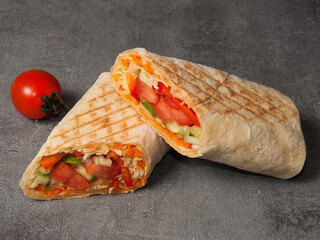 vegetarian grilled shawarma on a gray background. close-up