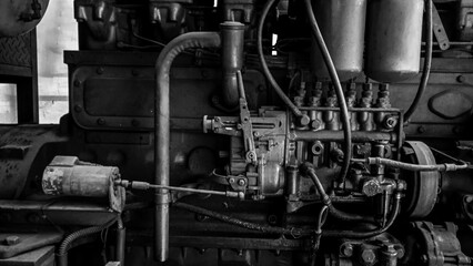 Fototapeta premium Close up Old rusty generator engine. black and white photo