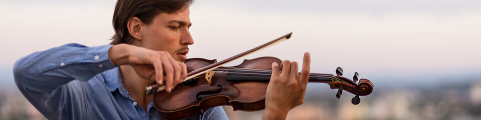 Linkedin banner with an inspired musician playing the violin