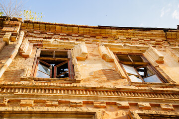 Fototapeta premium ruins. an old ruined building. broken glass in the windows.