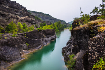 Rainy summer in a Venetikos River view near the village of Eleftherochori, Grevena Municipality, West Macedonia, Greece