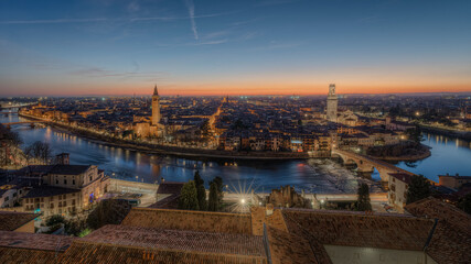 Verona view of Castelvecchio and Ponte Scaligero from San Pietro, February 2022 orange sunset, you...