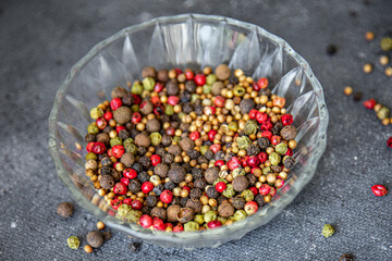 5 spices peppercorn  red, black, green and white pepper, coriander fresh healthy food snack on the table copy space food background 