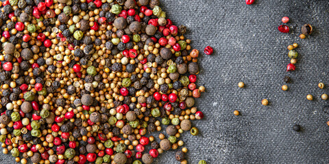 5 spices peppercorn  red, black, green and white pepper, coriander fresh healthy food snack on the table copy space food background 