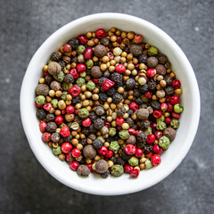5 spices peppercorn  red, black, green and white pepper, coriander fresh healthy food snack on the table copy space food background 