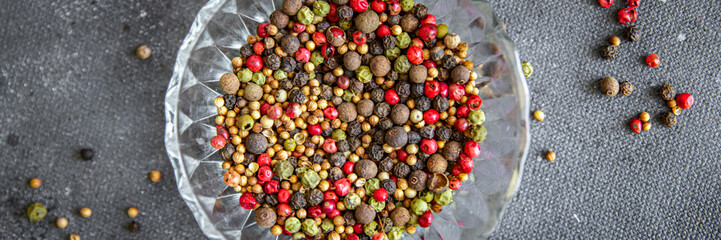 5 spices peppercorn  red, black, green and white pepper, coriander fresh healthy food snack on the table copy space food background 