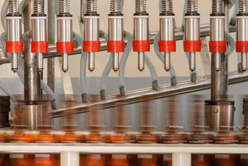 Bottling of alcoholic beverage in the industry.