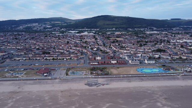 A drone view of Aberavon Beach and the Sandfields Estate in Port Talbot UK.
