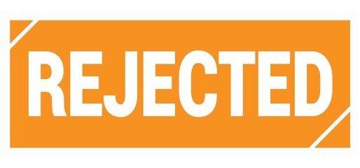 REJECTED text written on orange stamp sign.