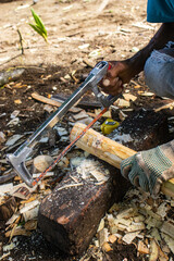 Obraz premium Men building a bamboo house