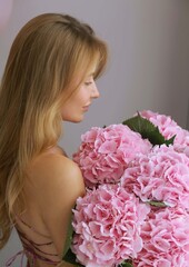 girl with pink flowers hydrangeas
