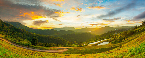 Plakat panoramic view of mountains and sky,Forested hills in rising fog. Mountain sunset hills.